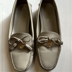 Prada Women's Beige Loafers with Gold Accent | Size 37.5